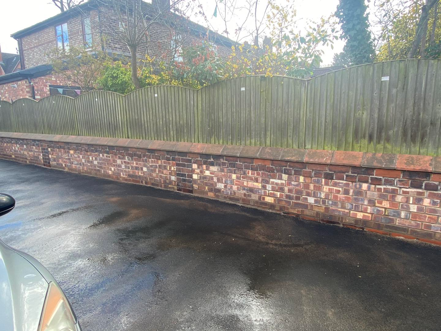 Brick boundary wall and fence repair